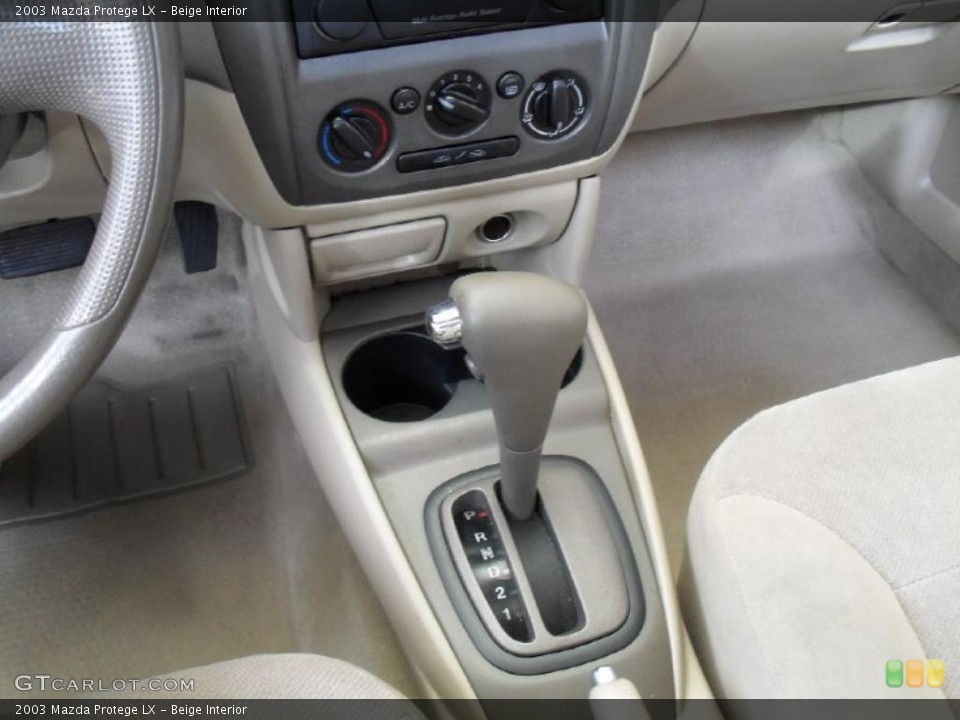 Beige Interior Transmission for the 2003 Mazda Protege LX #41084335