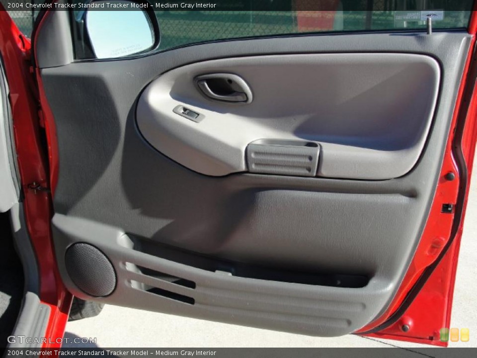 Medium Gray Interior Door Panel for the 2004 Chevrolet Tracker  #41110086