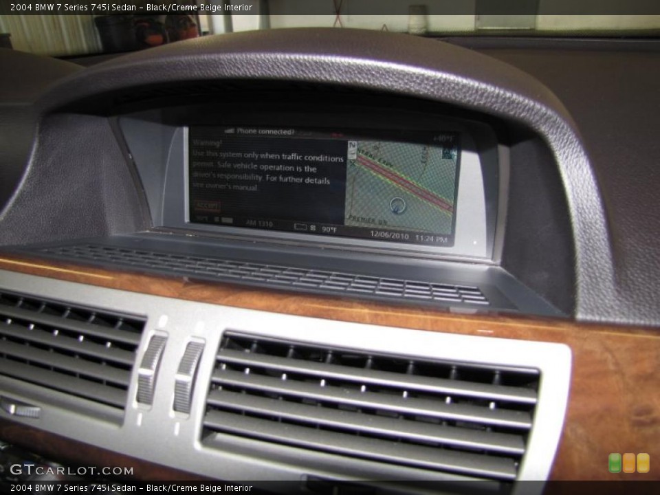 Black/Creme Beige Interior Navigation for the 2004 BMW 7 Series 745i Sedan #41116419