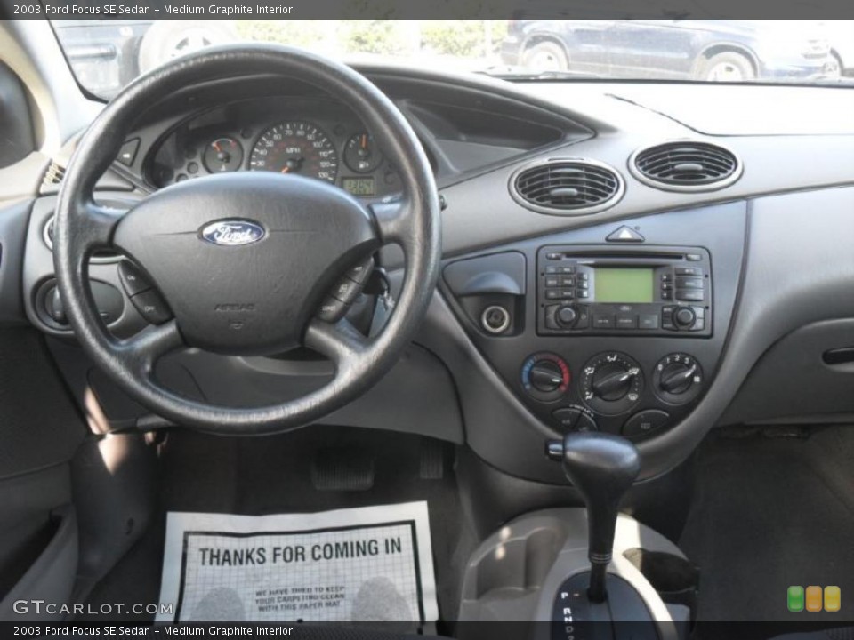 Medium Graphite Interior Dashboard for the 2003 Ford Focus SE Sedan #41129394