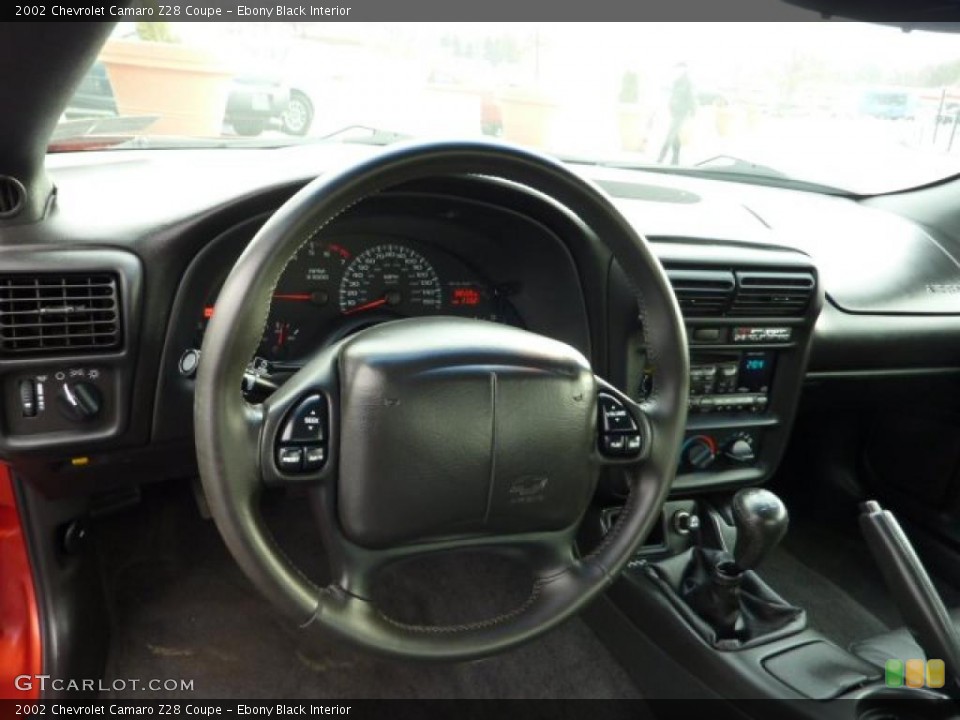 Ebony Black Interior Dashboard for the 2002 Chevrolet Camaro Z28 Coupe #41153756