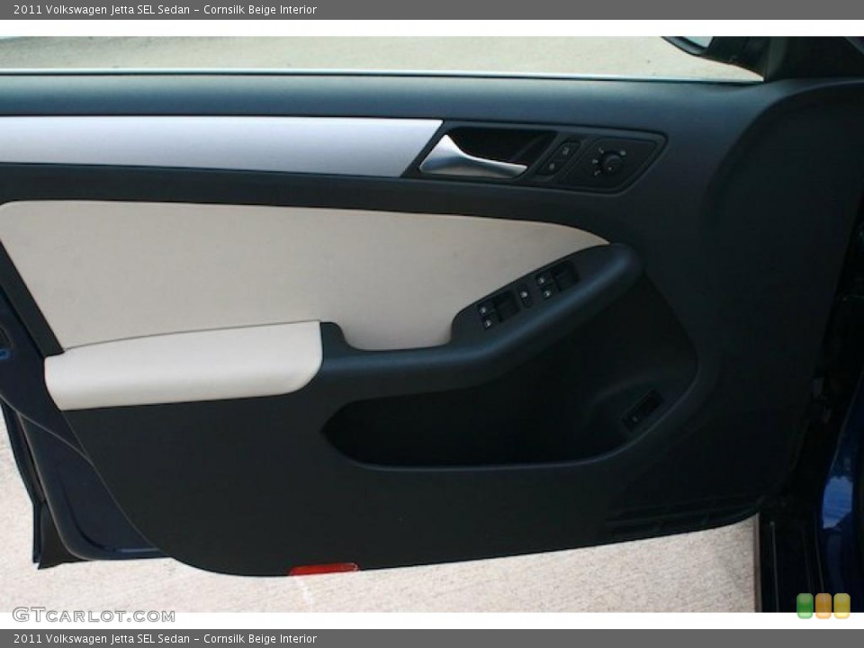 Cornsilk Beige Interior Door Panel for the 2011 Volkswagen Jetta SEL Sedan #41165856