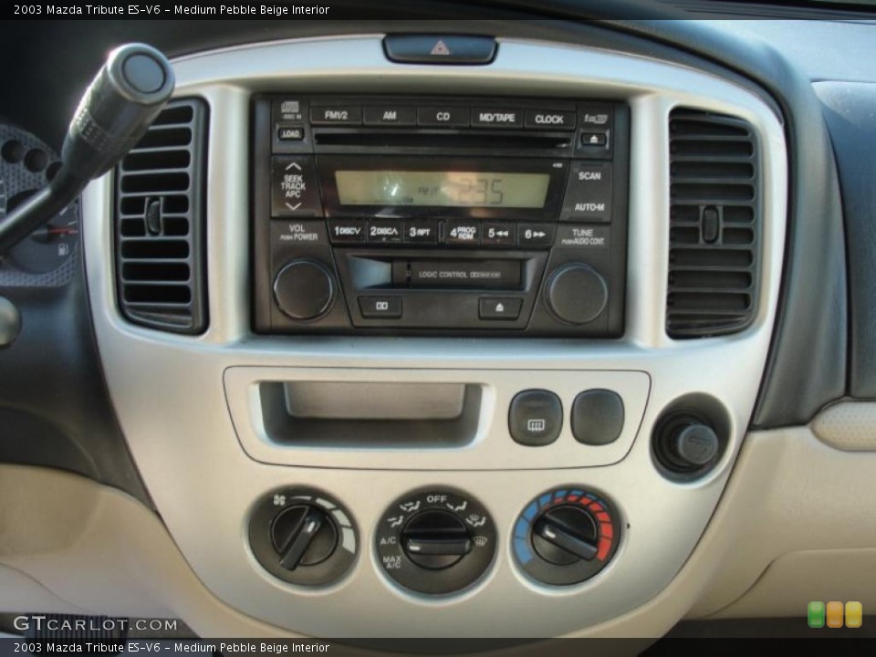 Medium Pebble Beige Interior Controls for the 2003 Mazda Tribute ES-V6 #41171862