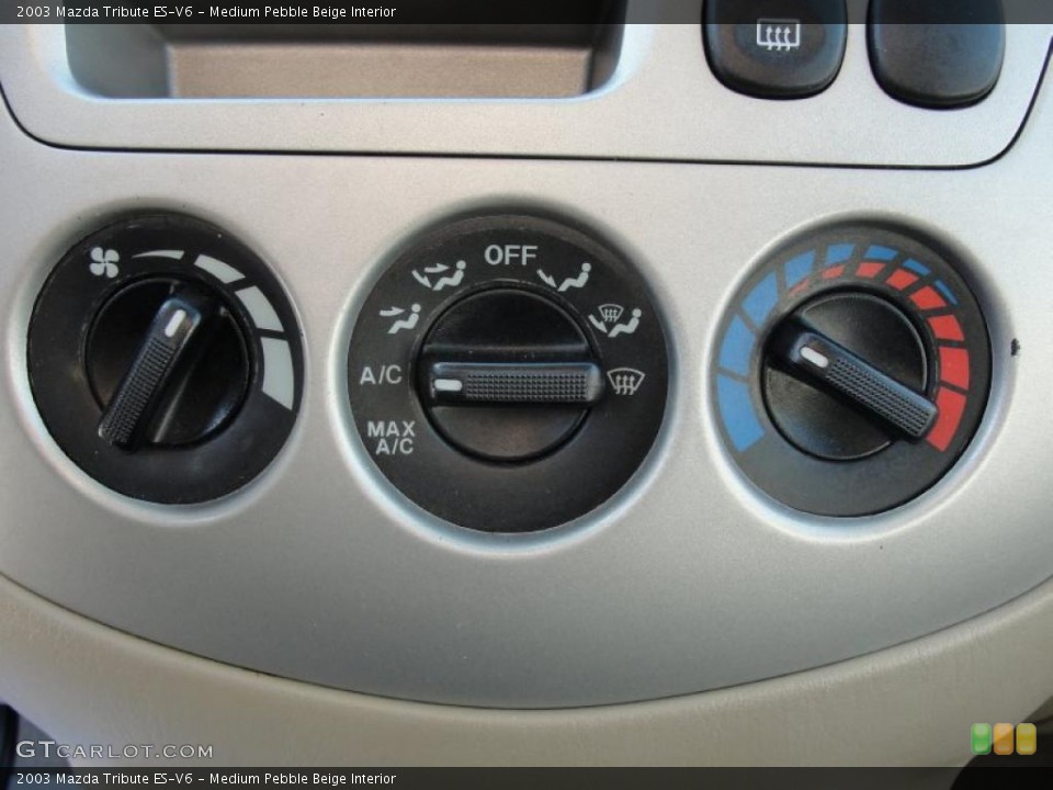 Medium Pebble Beige Interior Controls for the 2003 Mazda Tribute ES-V6 #41171914