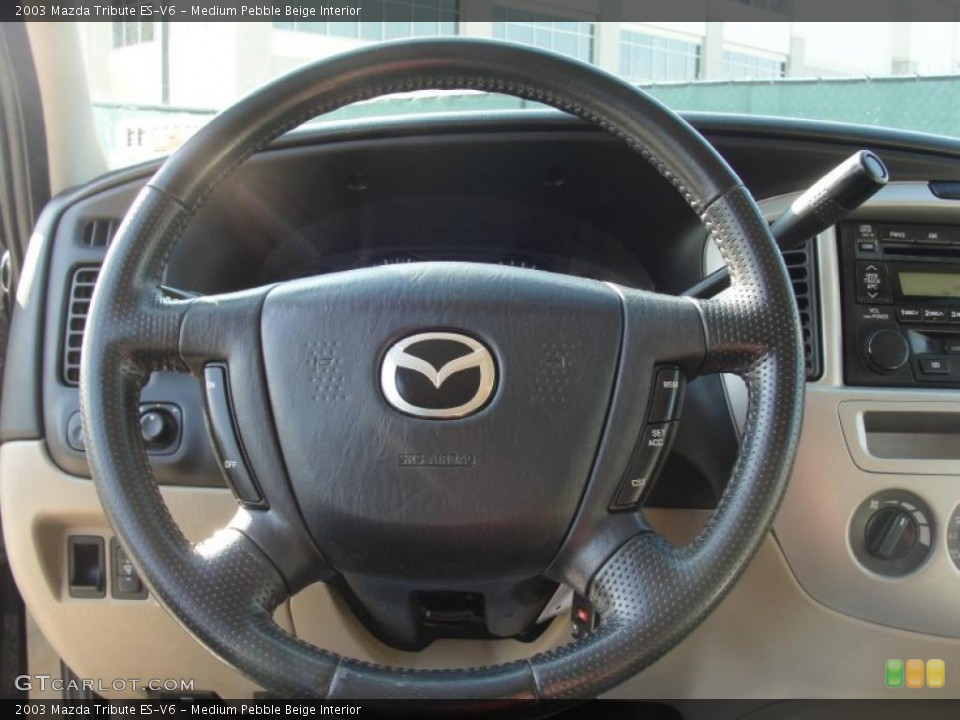 Medium Pebble Beige Interior Steering Wheel for the 2003 Mazda Tribute ES-V6 #41171926