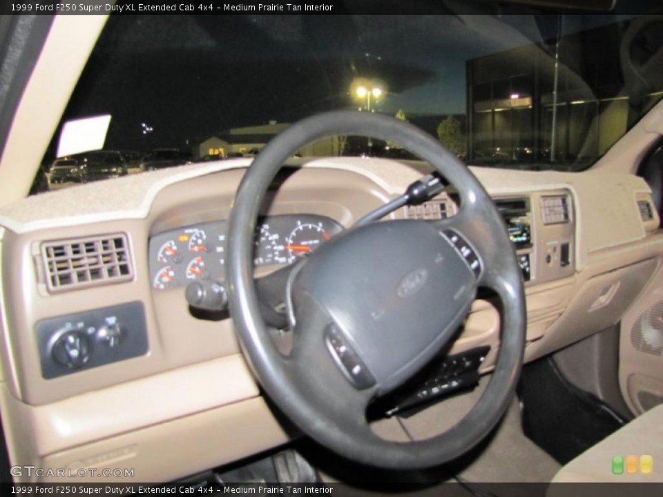 Medium Prairie Tan Interior Steering Wheel for the 1999 Ford F250 Super Duty XL Extended Cab 4x4 #41219599