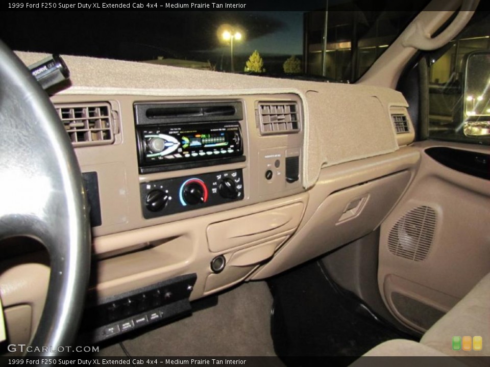 Medium Prairie Tan Interior Dashboard for the 1999 Ford F250 Super Duty XL Extended Cab 4x4 #41219611