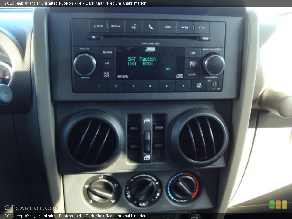 Dark Khaki/Medium Khaki Interior Controls for the 2010 Jeep Wrangler Unlimited Rubicon 4x4 #41241540