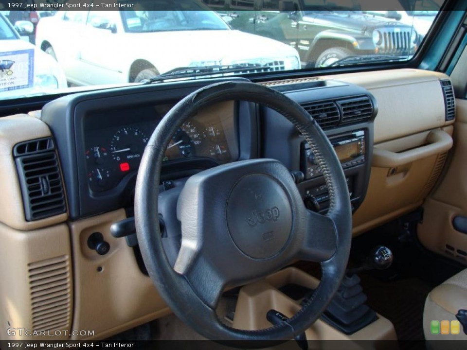 Tan Interior Dashboard for the 1997 Jeep Wrangler Sport 4x4 #41241872