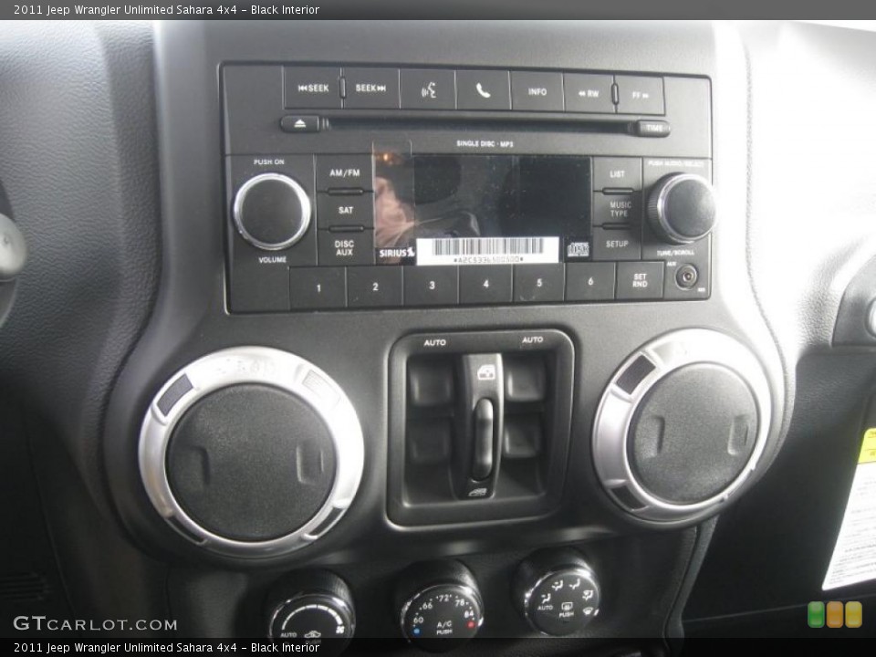 Black Interior Controls for the 2011 Jeep Wrangler Unlimited Sahara 4x4 #41249781