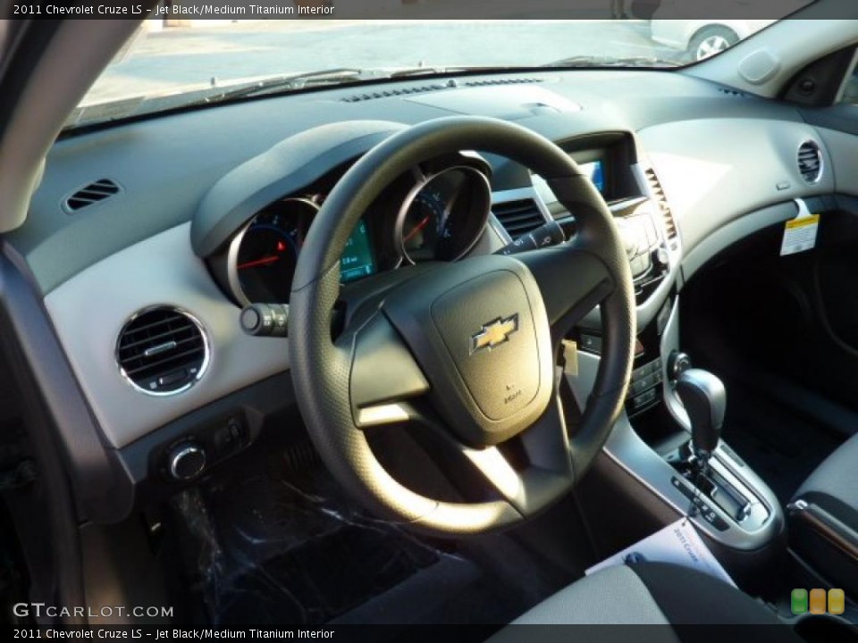 Jet Black/Medium Titanium Interior Dashboard for the 2011 Chevrolet Cruze LS #41253161