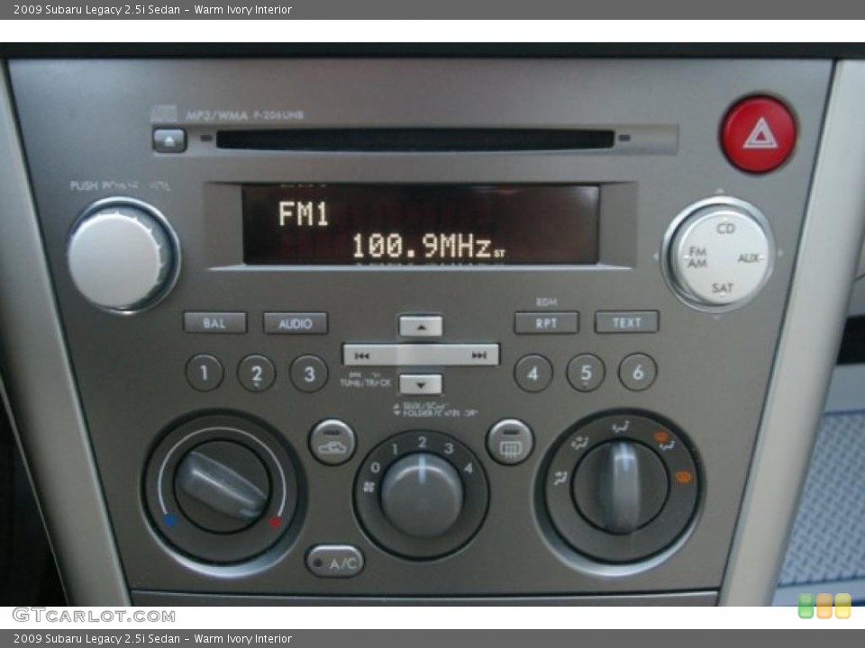 Warm Ivory Interior Controls for the 2009 Subaru Legacy 2.5i Sedan #41265473