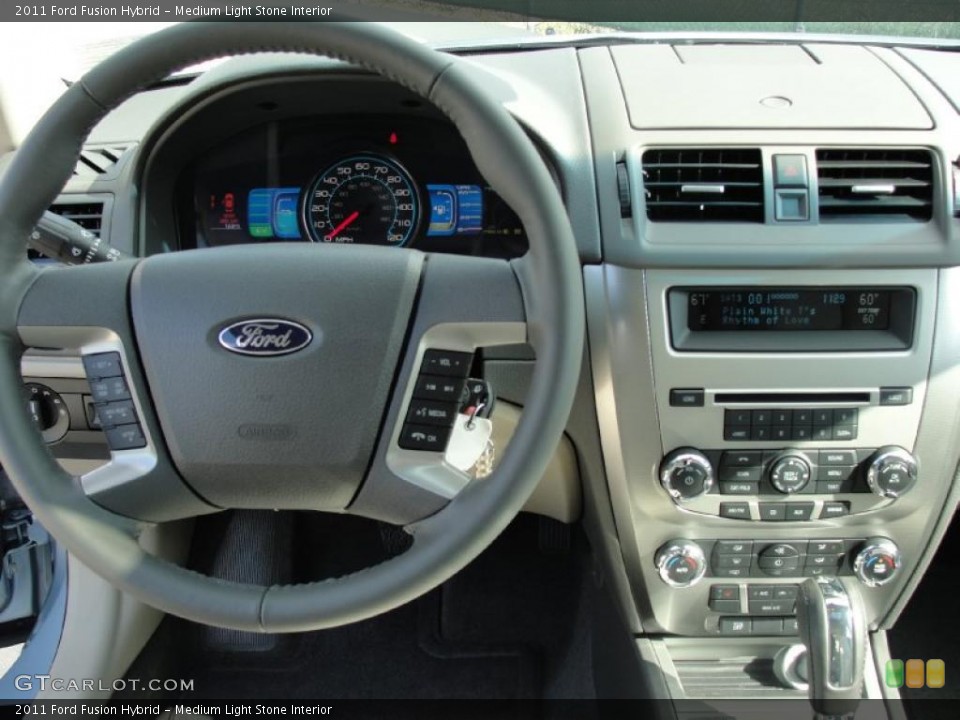 Medium Light Stone Interior Dashboard for the 2011 Ford Fusion Hybrid #41272501