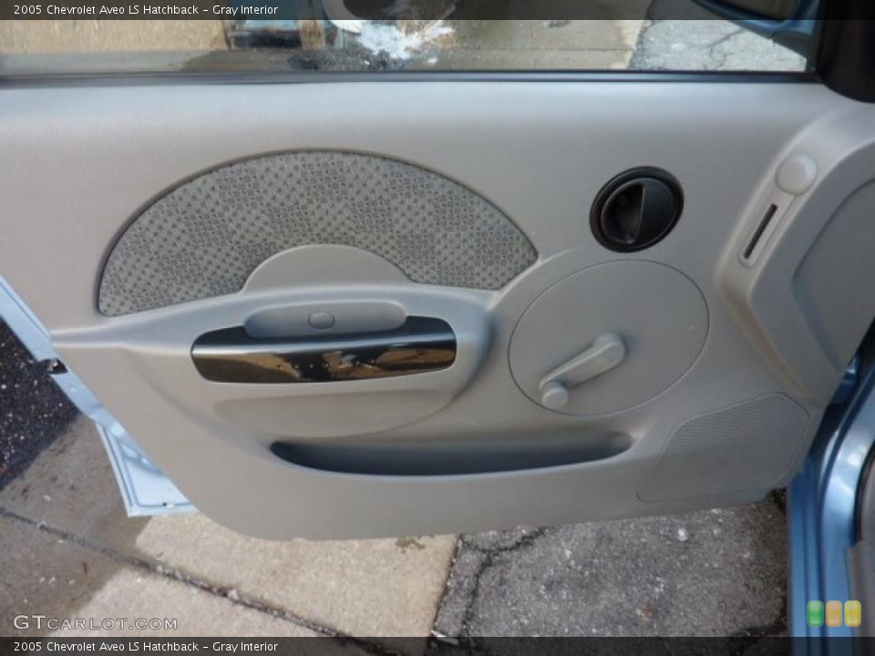 Gray Interior Door Panel for the 2005 Chevrolet Aveo LS Hatchback #41292569