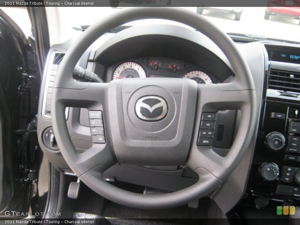 Charcoal Interior Steering Wheel for the 2011 Mazda Tribute i Touring #41344267