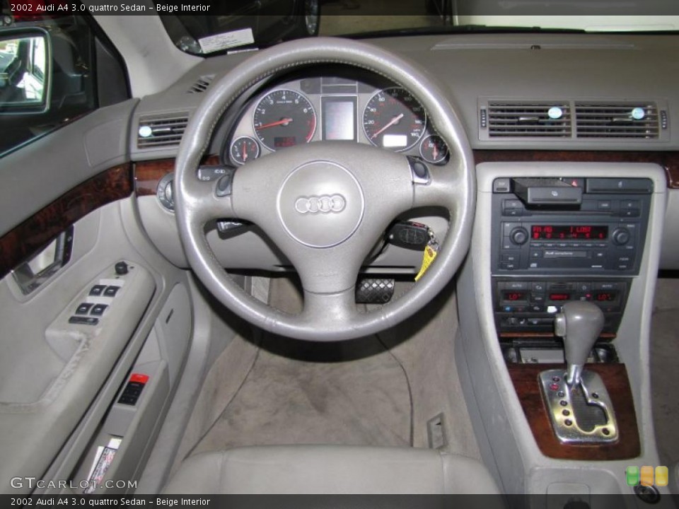 Beige Interior Dashboard for the 2002 Audi A4 3.0 quattro Sedan #41355099