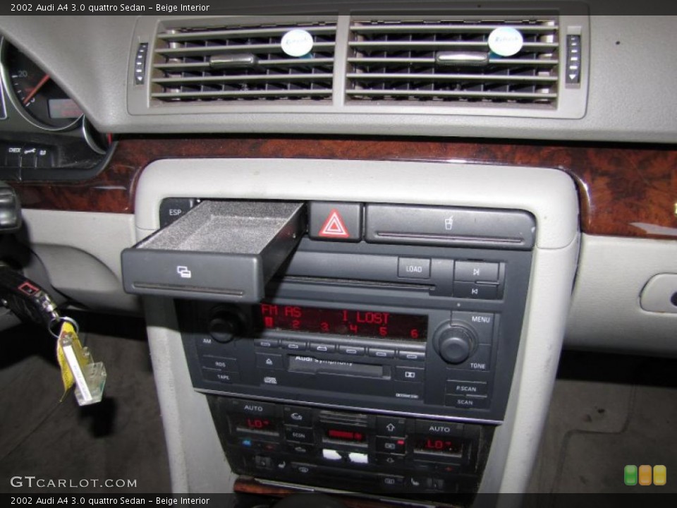 Beige Interior Controls for the 2002 Audi A4 3.0 quattro Sedan #41355115