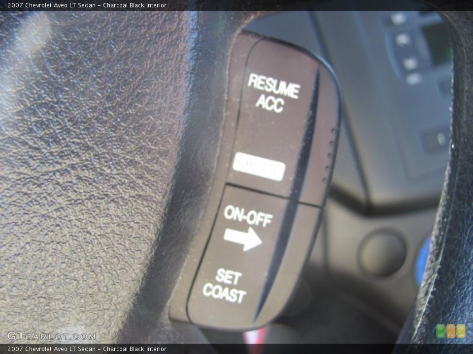 Charcoal Black Interior Controls for the 2007 Chevrolet Aveo LT Sedan #41356047