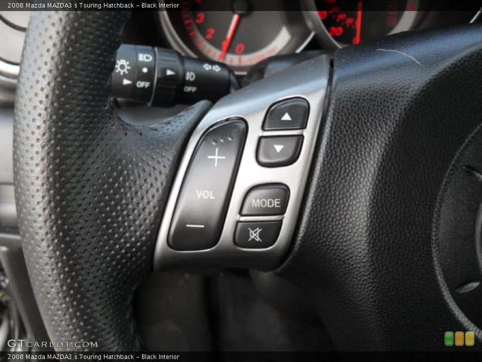 Black Interior Controls for the 2008 Mazda MAZDA3 s Touring Hatchback #41378760