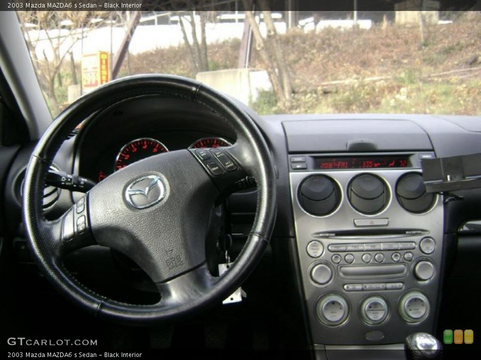 Black Interior Dashboard for the 2003 Mazda MAZDA6 s Sedan #41379260
