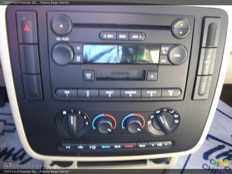 Pebble Beige Interior Controls for the 2004 Ford Freestar SEL #41394388