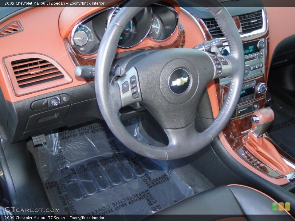 Ebony/Brick Interior Steering Wheel for the 2009 Chevrolet Malibu LTZ Sedan #41407527