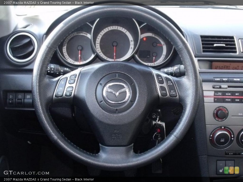 Black Interior Steering Wheel for the 2007 Mazda MAZDA3 s Grand Touring Sedan #41490423