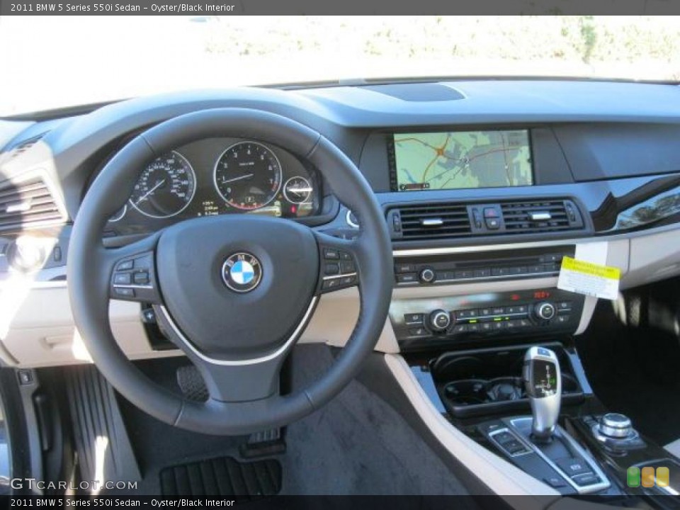 Oyster/Black Interior Dashboard for the 2011 BMW 5 Series 550i Sedan #41532113