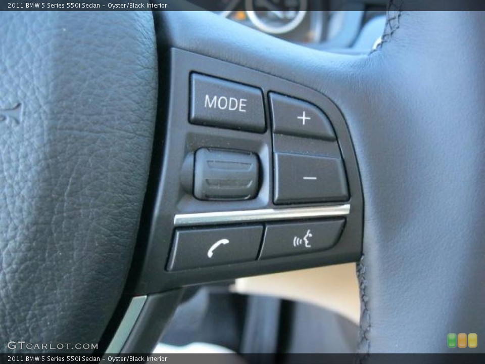 Oyster/Black Interior Controls for the 2011 BMW 5 Series 550i Sedan #41532169
