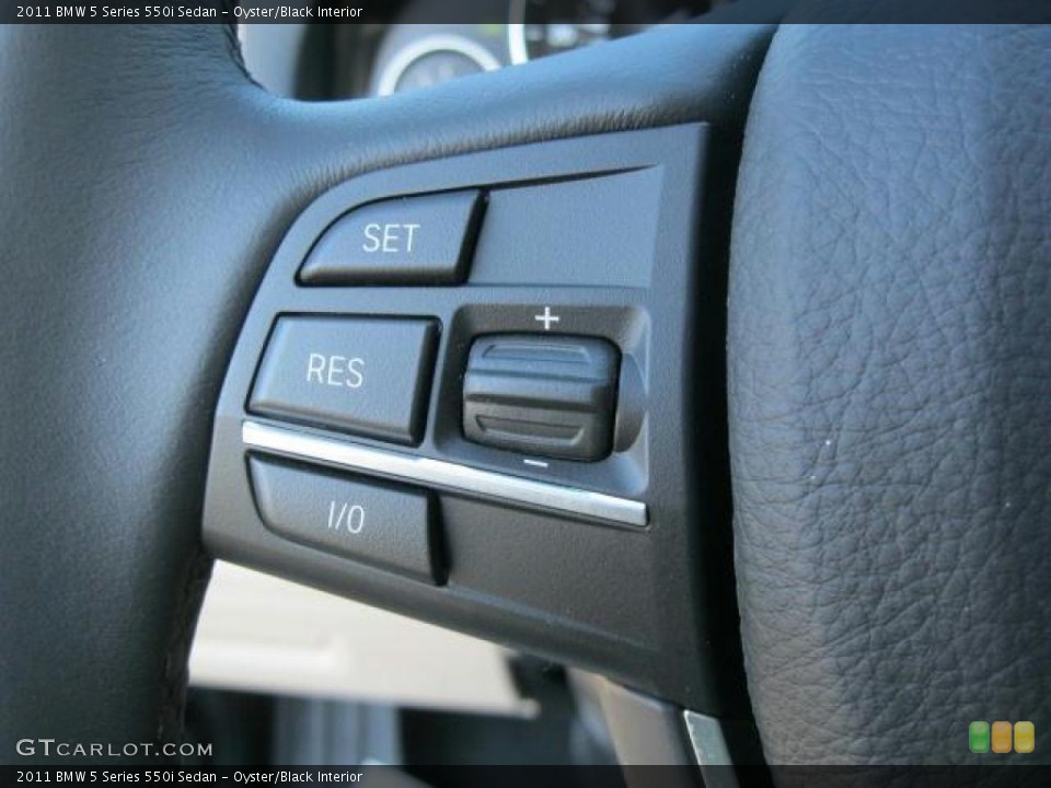 Oyster/Black Interior Controls for the 2011 BMW 5 Series 550i Sedan #41532181
