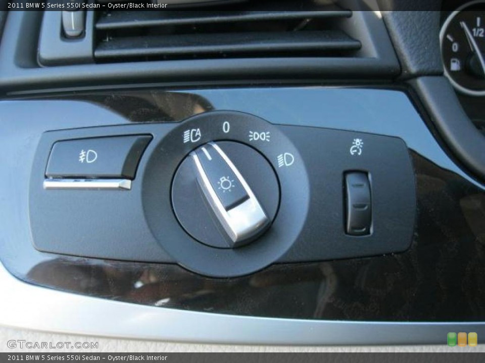 Oyster/Black Interior Controls for the 2011 BMW 5 Series 550i Sedan #41532205