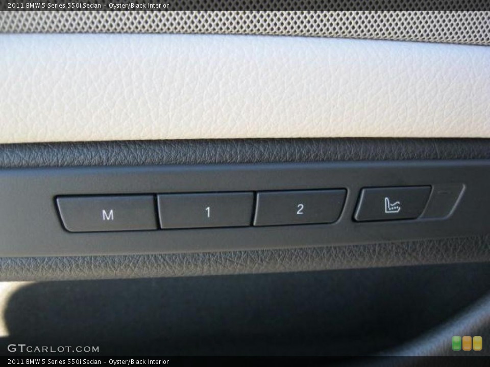 Oyster/Black Interior Controls for the 2011 BMW 5 Series 550i Sedan #41532229