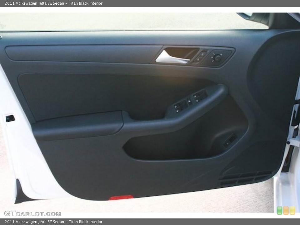Titan Black Interior Door Panel for the 2011 Volkswagen Jetta SE Sedan #41532461