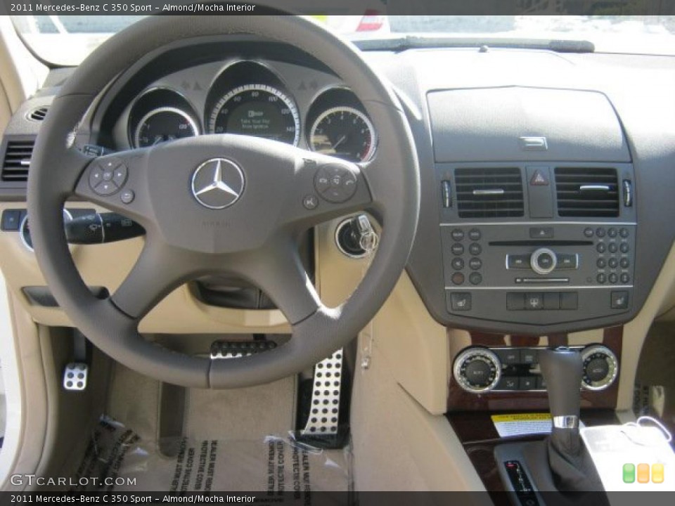 Almond/Mocha Interior Dashboard for the 2011 Mercedes-Benz C 350 Sport #41553327