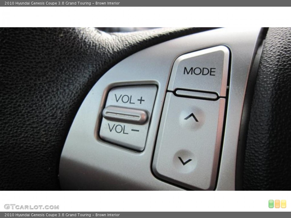 Brown Interior Controls for the 2010 Hyundai Genesis Coupe 3.8 Grand Touring #41555806