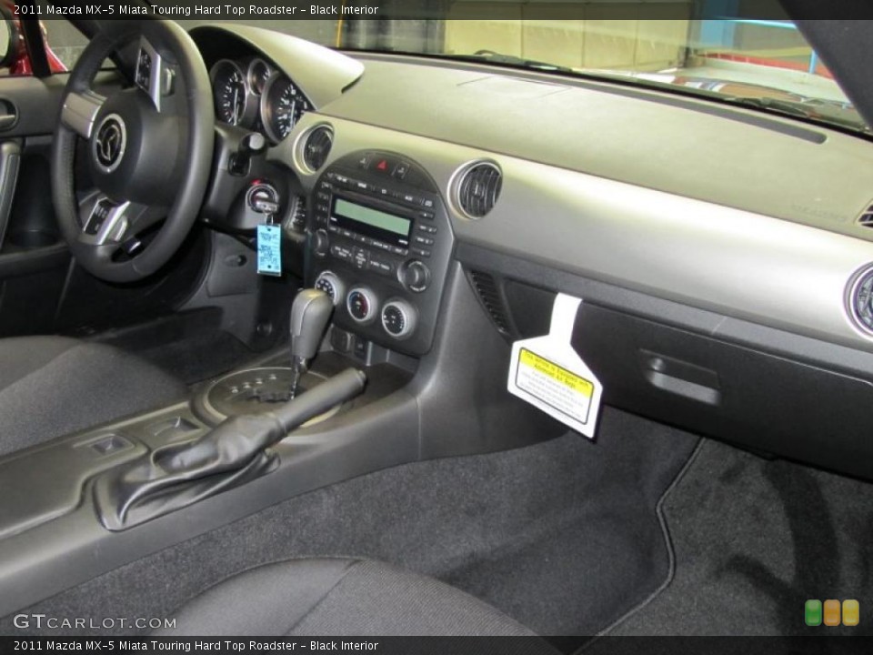 Black Interior Dashboard for the 2011 Mazda MX-5 Miata Touring Hard Top Roadster #41557450