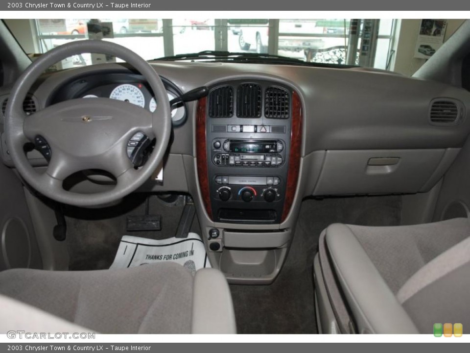 Taupe Interior Dashboard for the 2003 Chrysler Town & Country LX #41557506