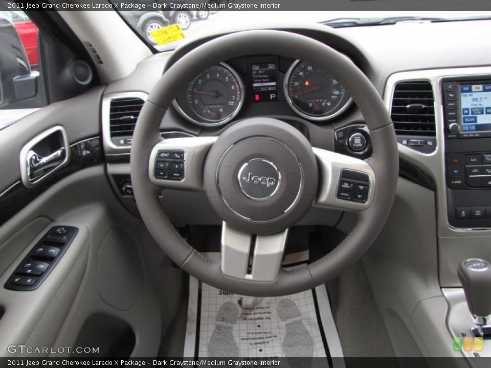Dark Graystone/Medium Graystone Interior Steering Wheel for the 2011 Jeep Grand Cherokee Laredo X Package #41563551