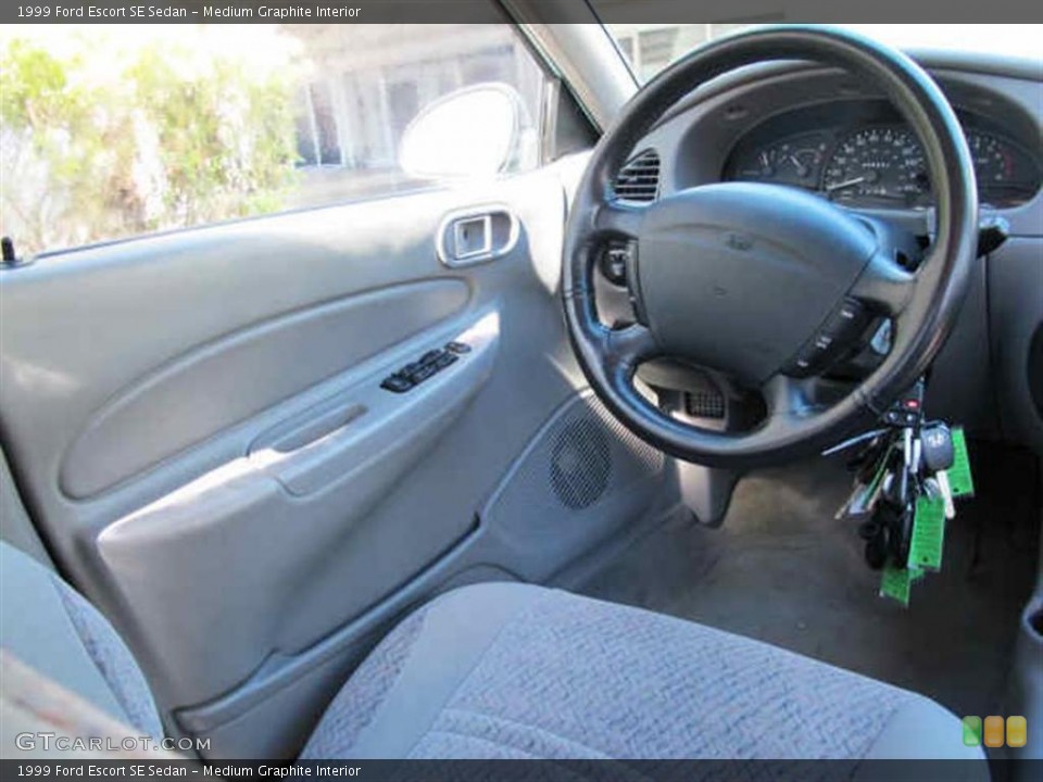 Medium Graphite Interior Steering Wheel for the 1999 Ford Escort SE Sedan #41566179