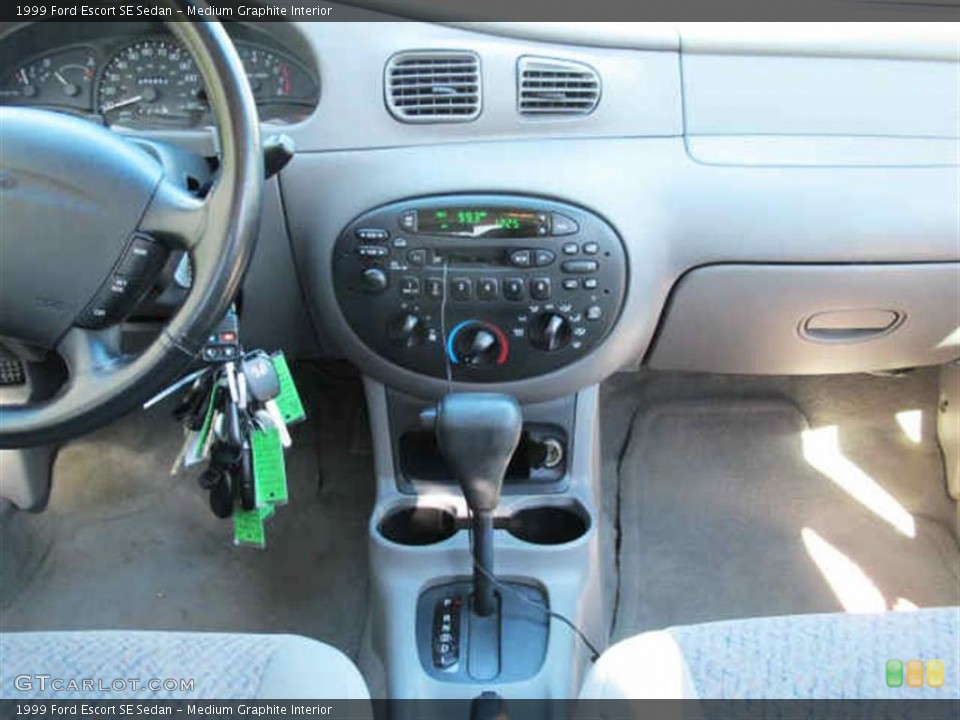Medium Graphite Interior Controls for the 1999 Ford Escort SE Sedan #41566187