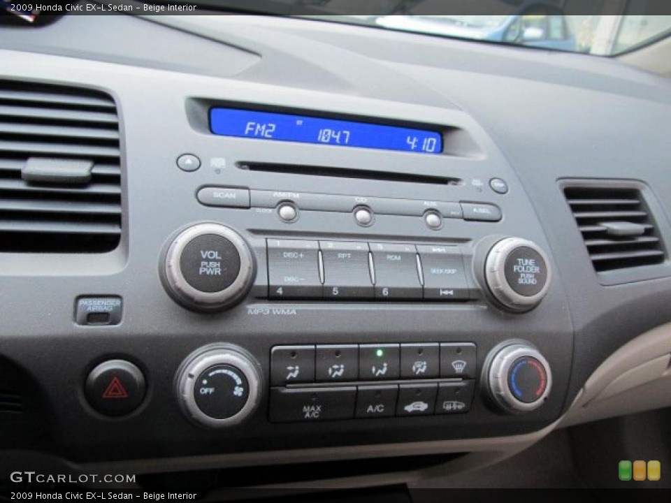 Beige Interior Controls for the 2009 Honda Civic EX-L Sedan #41573063