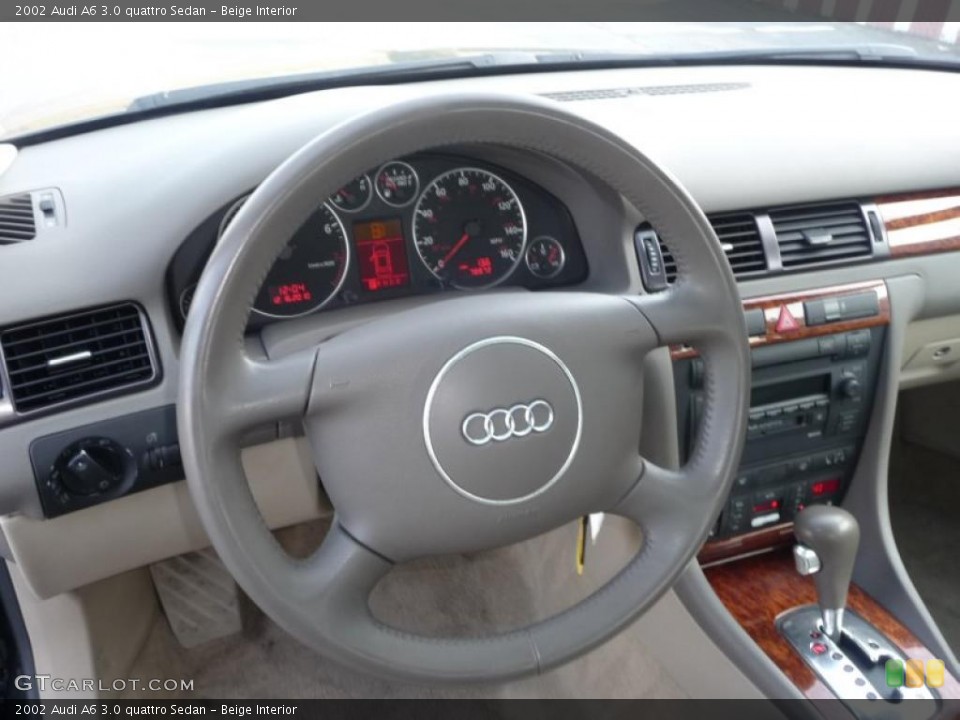 Beige Interior Steering Wheel for the 2002 Audi A6 3.0 quattro Sedan #41578831