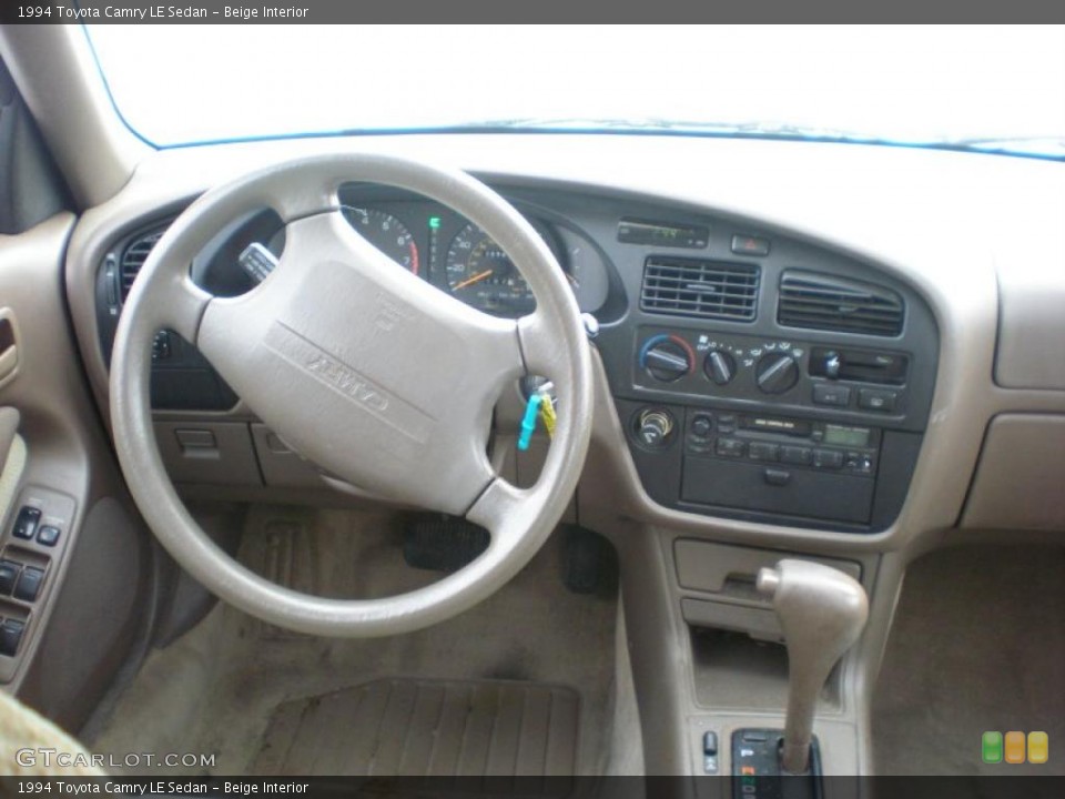 Beige Interior Dashboard for the 1994 Toyota Camry LE Sedan #41598657