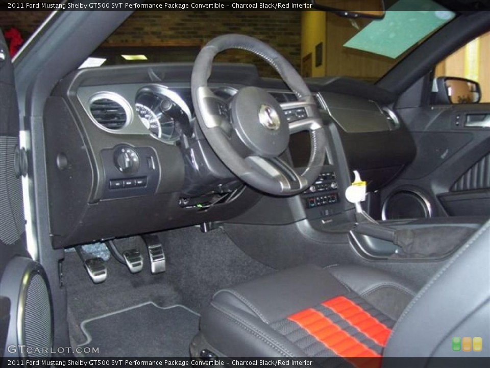 Charcoal Black/Red Interior Photo for the 2011 Ford Mustang Shelby GT500 SVT Performance Package Convertible #41618873