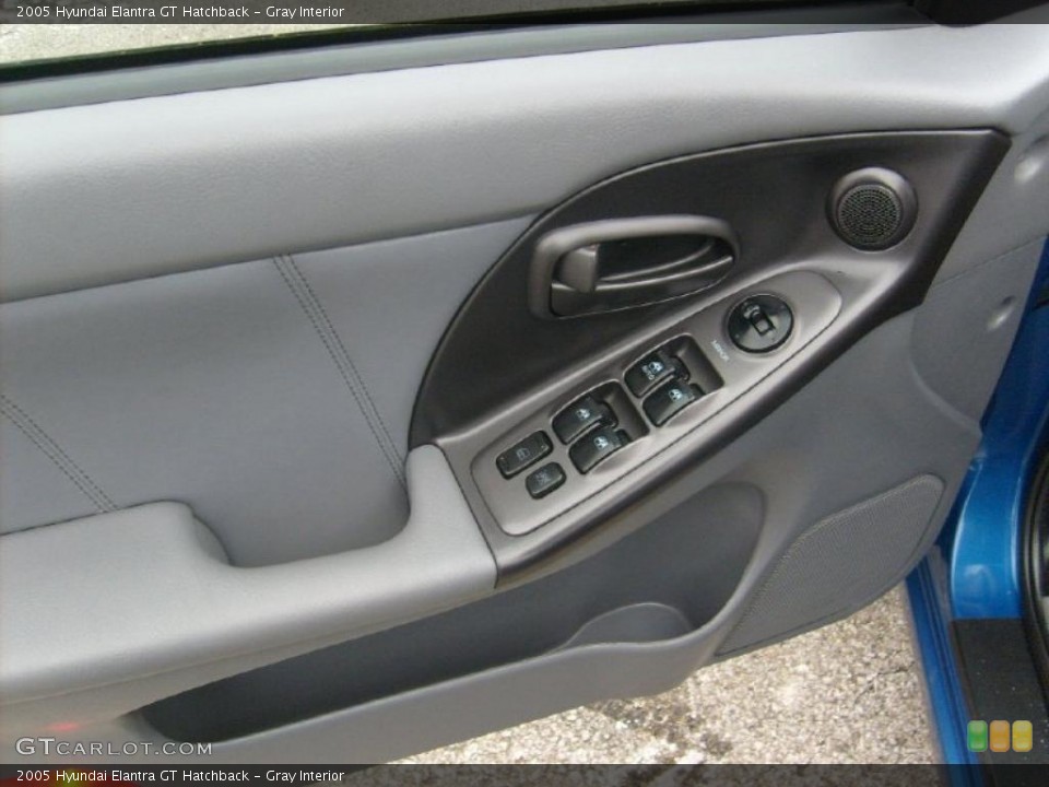 Gray Interior Door Panel for the 2005 Hyundai Elantra GT Hatchback #41637543