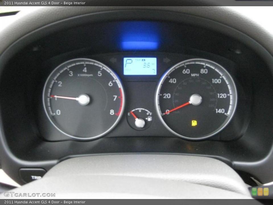 Beige Interior Gauges for the 2011 Hyundai Accent GLS 4 Door #41665047