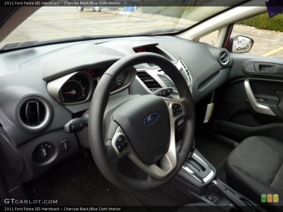 Charcoal Black/Blue Cloth Interior Dashboard for the 2011 Ford Fiesta SES Hatchback #41695665