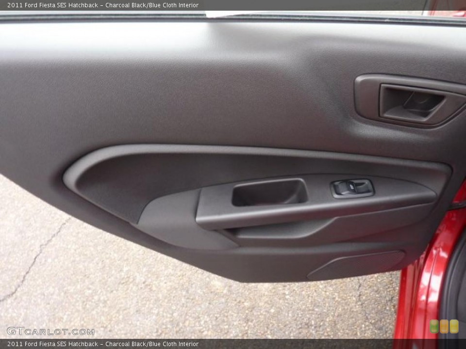 Charcoal Black/Blue Cloth Interior Door Panel for the 2011 Ford Fiesta SES Hatchback #41695685