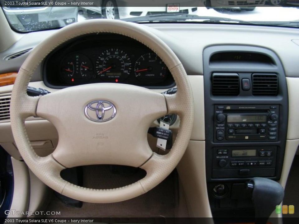 Ivory Interior Dashboard for the 2003 Toyota Solara SLE V6 Coupe #41716786
