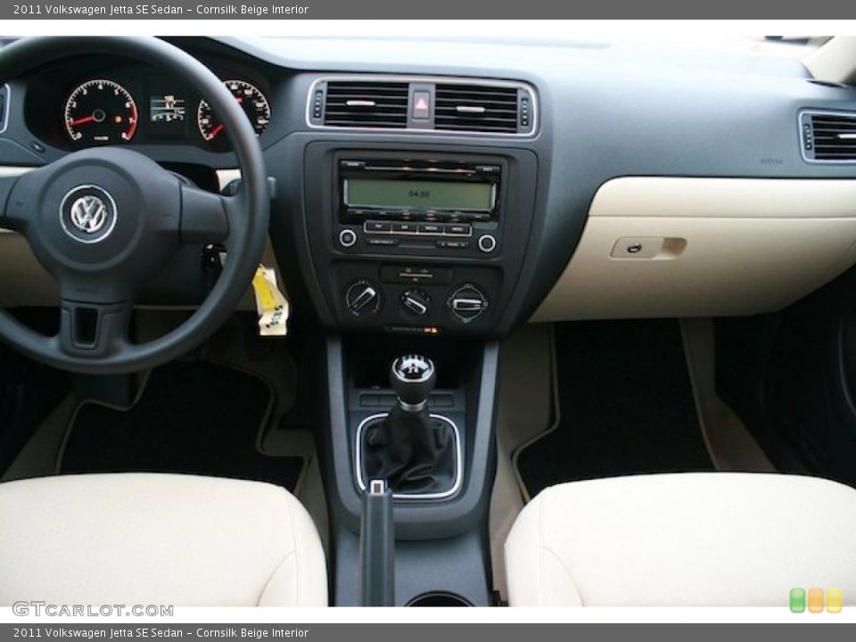 Cornsilk Beige Interior Dashboard for the 2011 Volkswagen Jetta SE Sedan #41726819